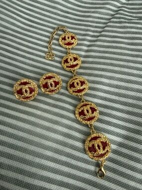 CHANEL Gold-Tone Bracelet and Earrings with Red Enamel CC Medallions